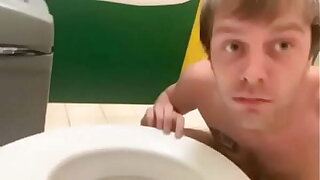toilet faggot in public bathroom